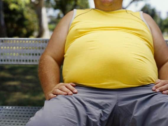 People who are obese or smoke face a six-month ban on routine surgery