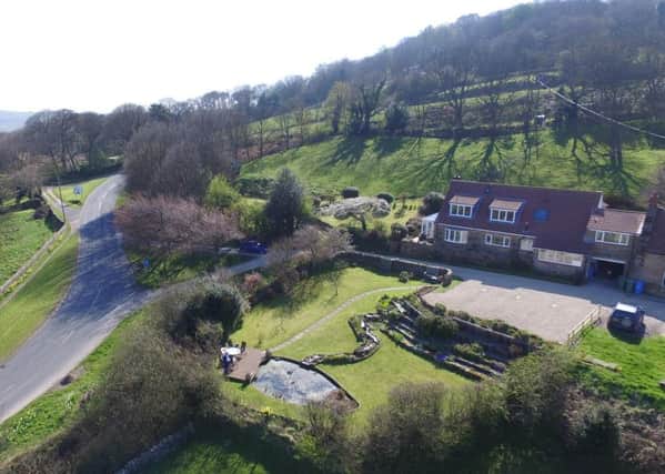 This six bedroom home in Fylingthorpe, near Whitby, operates as a B&B. It is for sale at Â£495,000, www.hendersons-online.co.uk