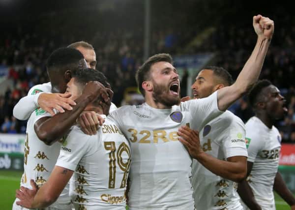 Leeds United's Pablo Hernandez (left) celebrates scoring his side's second goal of the game during the Carabao Cup, third round match at Turf Moor, Burnley.