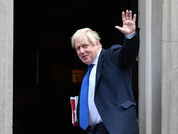 Show of unity: Foreign Secretary Boris Johnson arriving in Downing Street for a Cabinet meeting where Theresa May briefed her ministers yesterday on her plans for Brexit.