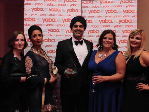 Ranjit Uppal, the 2016 winner of the Professional of the Year award, from Switalskis solicitors with colleagues