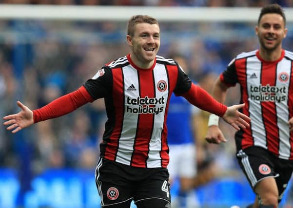 Sheffield United's John Fleck celebrates scoring his side's first goal in the Steel City derby (Picture: PA)