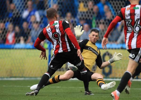 Sheffield United's Leon Clarke scores his side's fourth goal of the game during the Sky Bet Championship match at Hillsborough