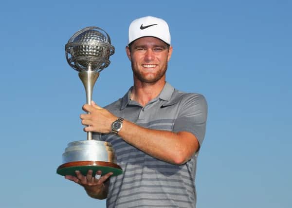 Lucas Bjerregaard poses with the trophy after his four-shot victory in the Portugal Masters (Picture: Warren Little/Getty Images).