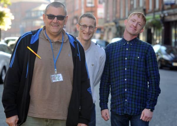 22 September 2017...... John Davis therapeutic alcohol and drugs worker with John and Chris who use the services on offer at the St George's Crypt charity in Leeds which helps those in dire circumstances, often with addiction problems, turn their lives around. Picture Tony Johnson.