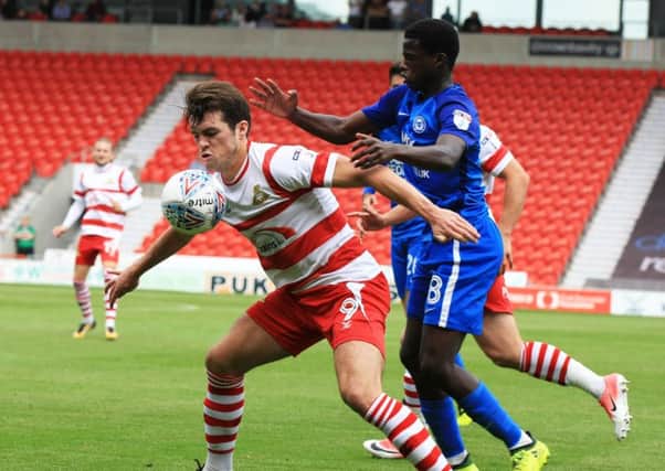 Doncaster Rovers' John Marquis in action against Peterborough United earlier this month (Picture: Chris Etchells).