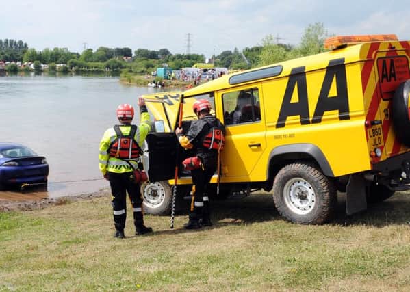 AA special rescue vehicle pulls at car from the lake at rescue Day 2013