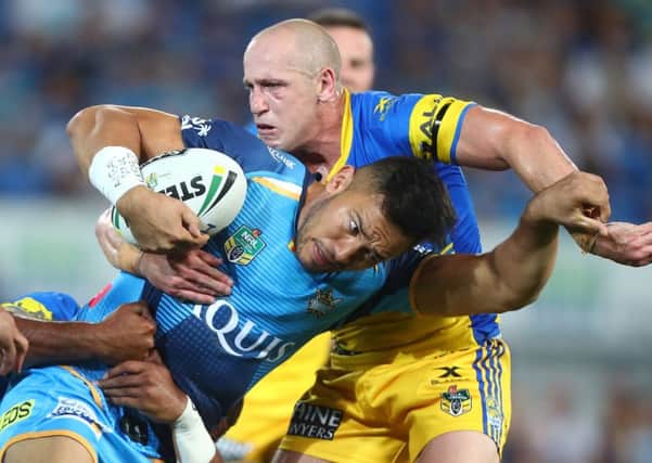 HELLO THERE: Nathaniel Peteru is tackled during an NRL match between the Gold Coast Titans and the Parramatta Eels. He will be playing for Leeds Rhinos next season.Picture: Chris Hyde/Getty Images