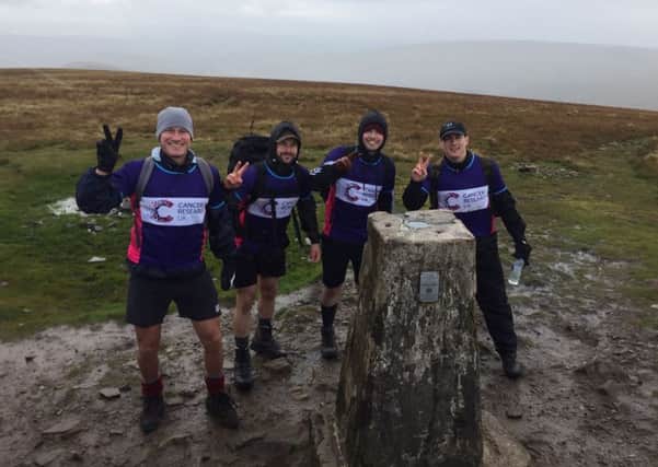 Greg Saunders and friends pictured during the Yorkshire Three Peaks charity challenge.