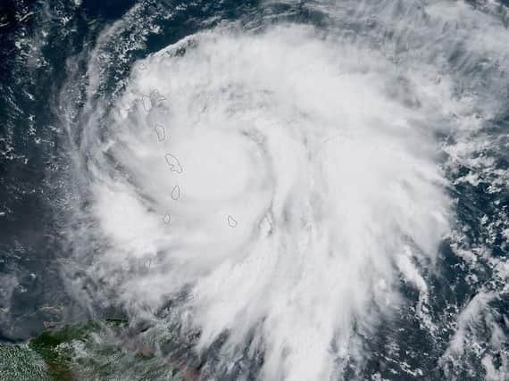 Hurricane Maria approaches the Leeward Islands, as the hurricane intensified into a "potentially catastrophic" category five storm and continued on a collision course with British overseas territories already battered by Irma. Picture: NOAA/PA Wire