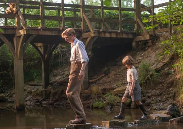 FATHER AND SON: Domhnall Gleeson as A A Milne and Will Tilston as Christopher Robin, above and inset. Pictures: PA Photo/Fox Searchlight Pictures/David Appleby