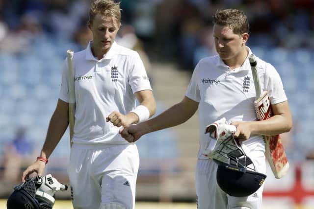 England's batsmen Joe Root, left, and Gary Ballance compliment each other while batting together in the West Indies in April 2015. Picture: AP/Ricardo Mazalan