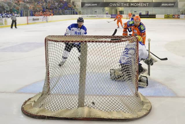 LEVEL PEGGING: Sheffield Steelers' MAtt Marquardt fores the puck home to make it 2-2 against Milton Keynes on Wednesday night at Ice Sheffield. Picture: Dean Woolley.