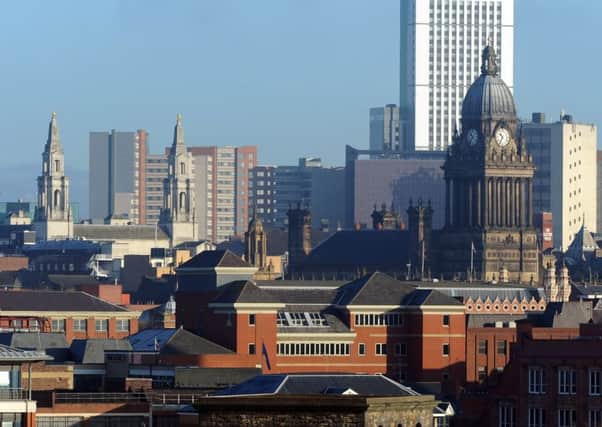10 January 2013......      Leeds Civic Hall and Leeds Town Hall in the city center skyline