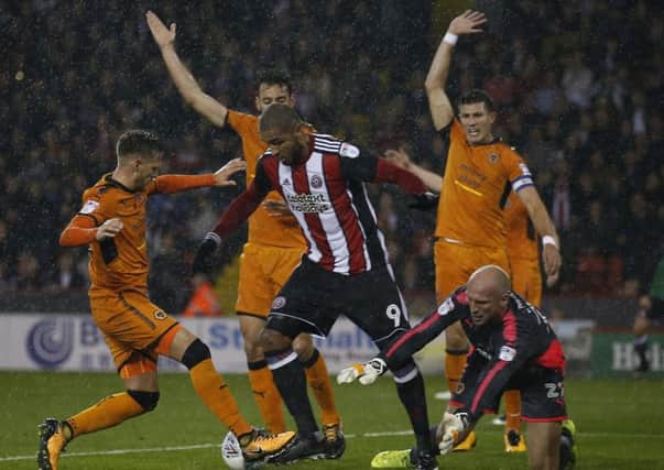 Match-winner: Blades striker Leon Clarke causes problems for the Wolves defence.
Picture: Simon Bellis/Sportimage