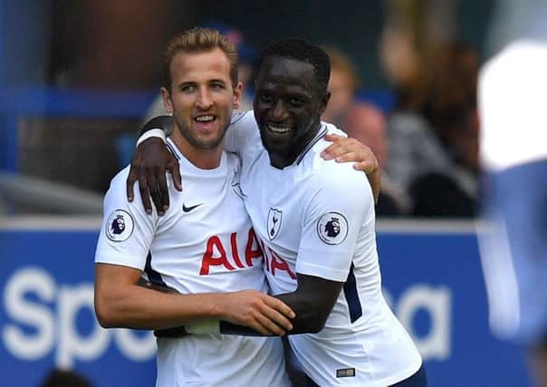Tottenham Hotspur's Harry Kane (left) celebrates scoring his side's first goal of the game agaoinst Everton, one of 11 goals he has scored this month. (PIcture: PA)