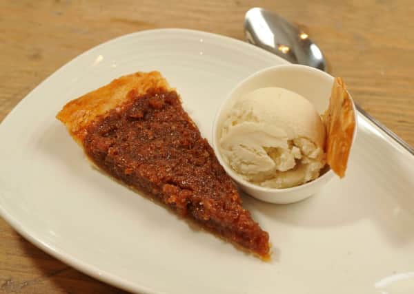 Treacle tart with bourbon vanilla ice cream. PIC: Tony Johnson