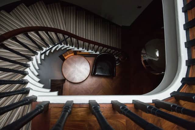 It took three craftsmen and a French polisher to restore the staircase