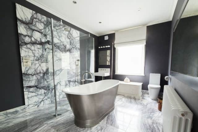 The bathroom with marble from Mandarin Stone