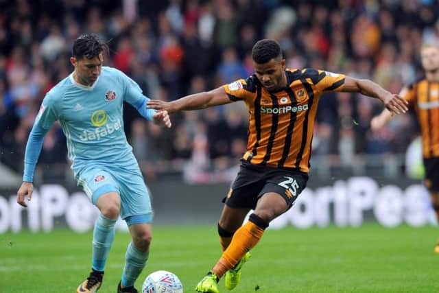 Hull City's Fraizer Campbell battles with Sunderland's Bryan Oviedo at the KCOM Stadium earlier this month. Picture:Tony Johnson.