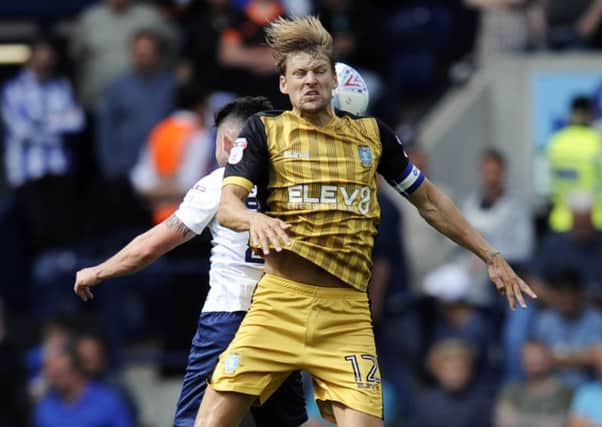 Sheffield Wednesday captain Glenn Loovens, seen in action against Preston North End's Sean Maguire (Picture: Steve Ellis).