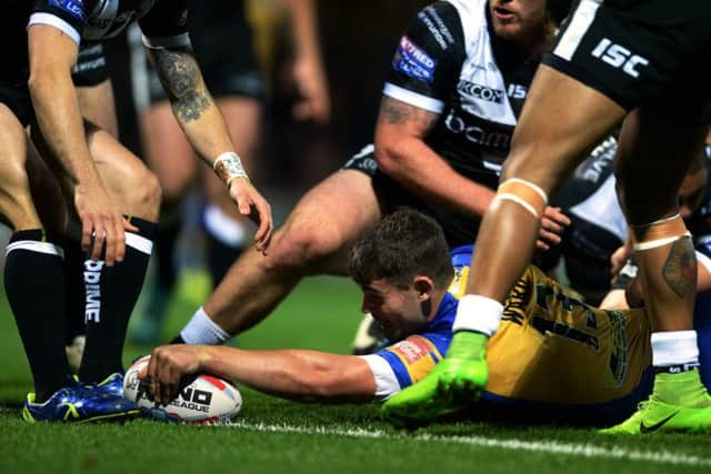 Stevie Ward scores the Rhinos opening try.