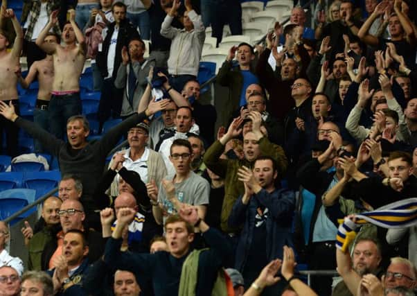 MARCHING ON TOGETHER: Leeds United fans in good voice at Cardiff.