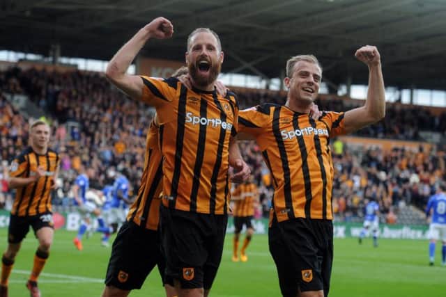 EASY STREET: 
Hull City's David Mayler celebrates his penalty with Kamil Grosicki in a first-half rout.  Picture Tony Johnson.