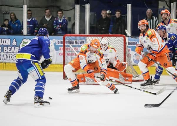 Sheffield Steelers defenceman Mark Matheson, left and Zack Fitzgerald help defend the net in Coventry. Picture: Scott Wiggins