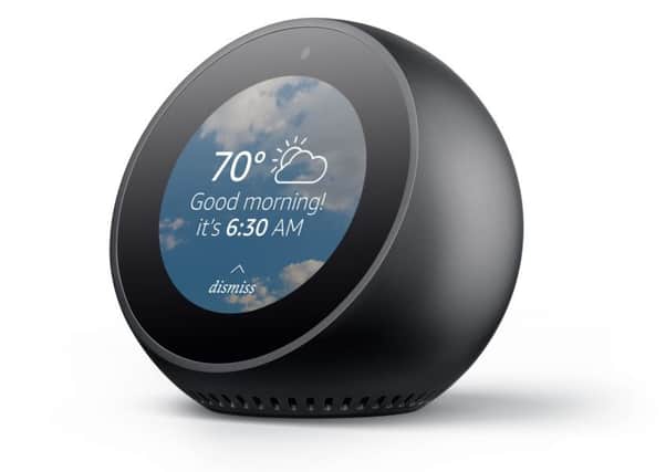 The Amazon Echo Spot is an alarm clock with a video camera
