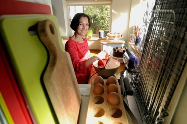 Caroline Pearman pictured with her cakes at her home at Chapel Allerton, Leeds. Picture by Simon Hulme