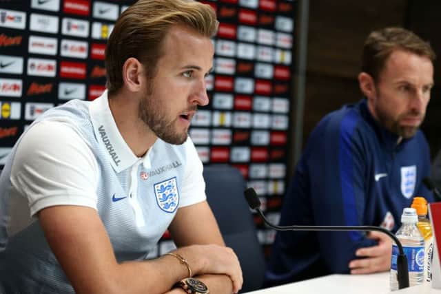 England's Harry Kane (left) and manager Gareth Southgate during a press conference at Enfield Training Centre, London. (Pictures: Steven Paston/PA Wire)