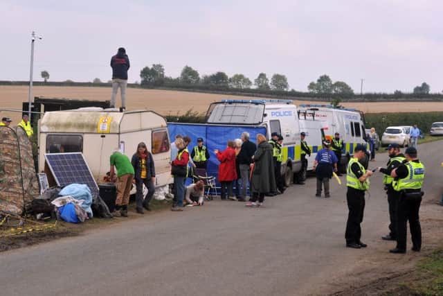 27 September 2017......     North Yorkshire Police work to free protestors chained together in the entrance to Third Energy's fracking site in Kirby Misperton near Malton. Picture Tony Johnson.