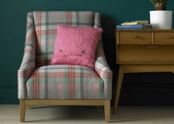 Chair upholstered in Moon's Cosmopolitan Melbourne fabric in aqua flamingo, Â£53.95pm, with a  Bronte by Moon Mohair cushion in Rose Lavender, Â£49.95