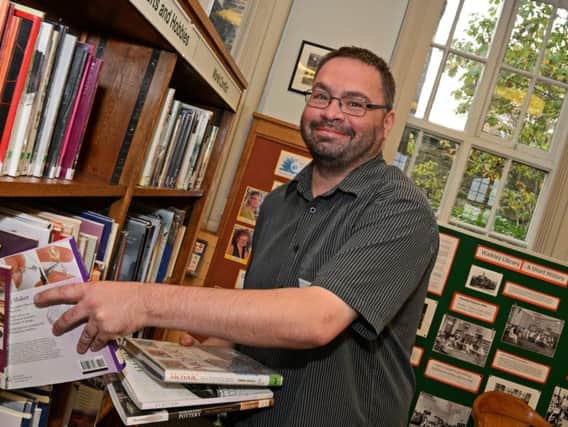 A library volunteer in Sheffield. Should police use library drop-in sessions?