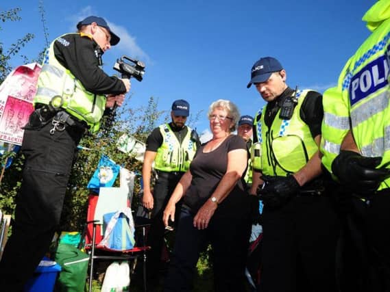 Jackie Brooks is moved by police in North Yorkshire.