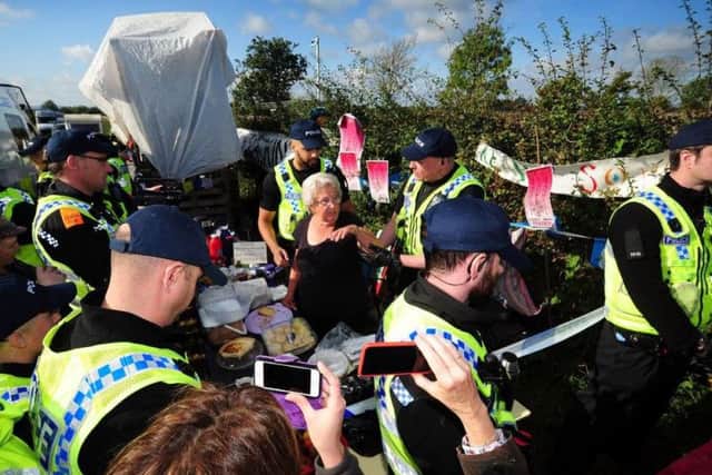 Jackie Brooks is moved by North Yorkshire Police at the site in Kirby Misperton.