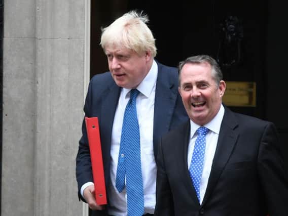 Boris Johnson and Liam Fox leave Downing Stret