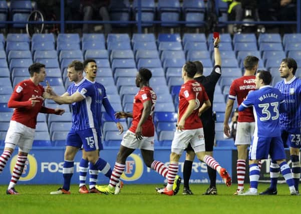 FLASHPOINT: Players exchange pleasantries during the Sheffield Wednesday v Barnsley clash at Hillsborough in December last year. Picture: Steve Ellis