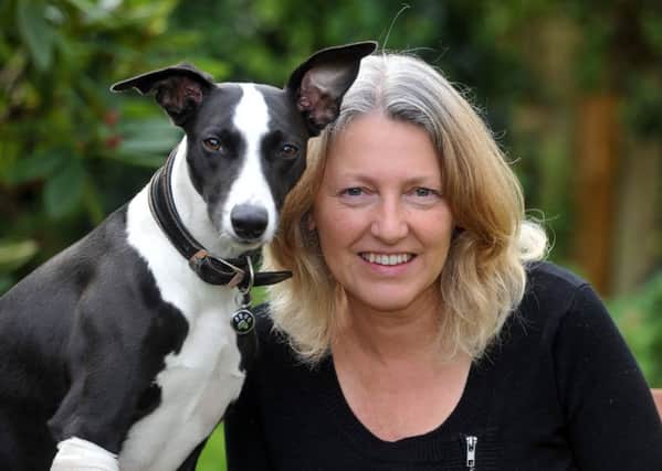 Alison Lock  with her dog, Casper at home in Meltham.  Picture Tony Johnson