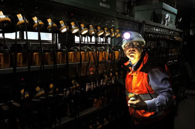 Shaun McLaughlin, of the National Coal Mining Museum  near Wakefield  in the lamp room