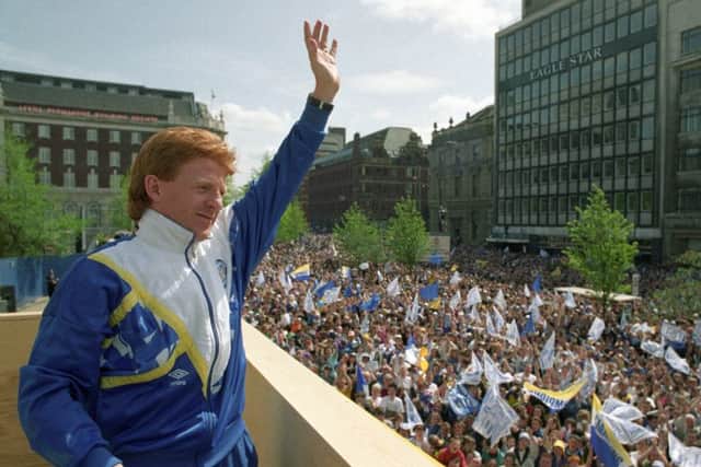 Gordon Strachan celebrates Leeds United's Division One title success in 1992 with the club's fans.