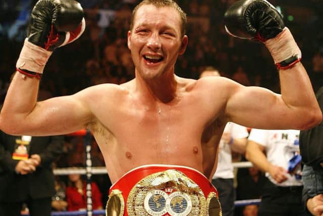 England's Clinton Woods celebrates his victory over Mexico's Julio Gonzalez in the IBF light-heavyweight title fight at Hallam FM Arena, Sheffield. (Picture: Peter Byrne/PA Wire)