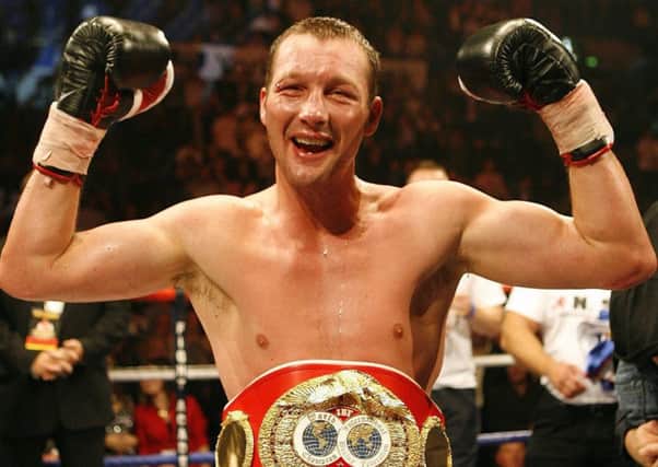 England's Clinton Woods celebrates his victory over Mexico's Julio Gonzalez in the IBF light-heavyweight title fight at Hallam FM Arena, Sheffield. (Picture: Peter Byrne/PA Wire)