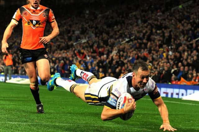 Danny McGuire dives in for the Rhinos second try in the Grand Final.