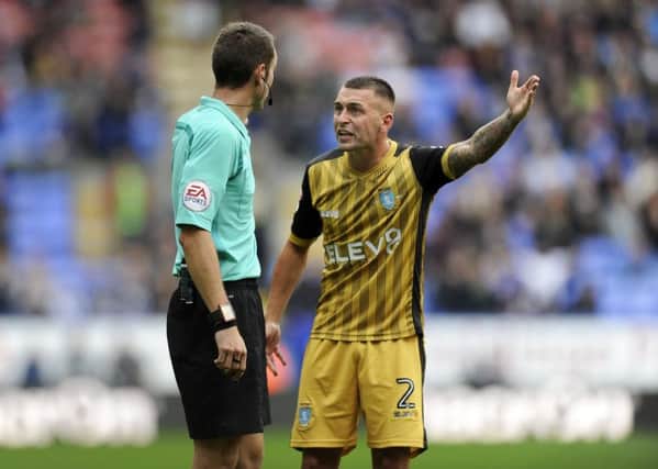 Remonstrating: Sheffield Wednesdays Jack Hunt questions the decision of referee David Coote not to give the Owls a late penalty. (Picture: Steve Ellis)