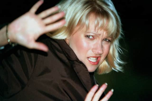 Kathy Glover (Malandra Burrows) looks in terror moments before becoming the victim of a hit and run, in 1998