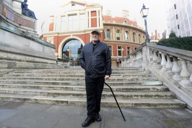 Phil Collins on the steps outside the Royal Albert Hall, London, after he announced a series of live shows at the venue in 2017. : Yui Mok/PA Wire