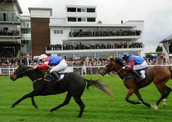 American Craftsman wins the first race of the new season of racing at Wetherby Racecourse, in the shadow of the new Millennium West Stand.
 (Picture: Jonathan Gawthorpe)