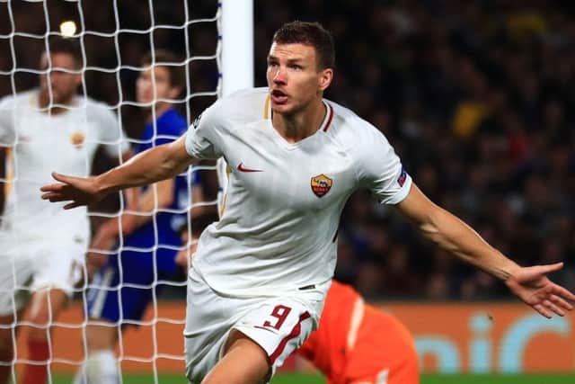 Roma's Edin Dzeko celebrates scoring his side's third goal of the game during the UEFA Champions League, Group C match at Stamford Bridge, London. (Picture: Tim Goode/PA Wire)